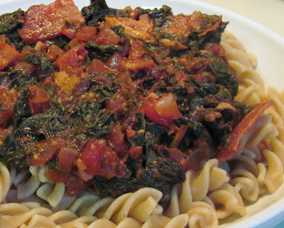 Pasta with chard, tomatoes and bacon