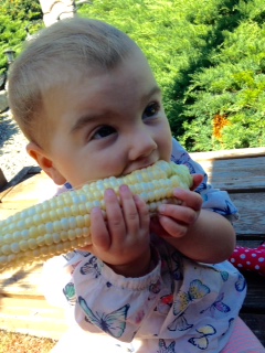Baby Nico eating sweet corn