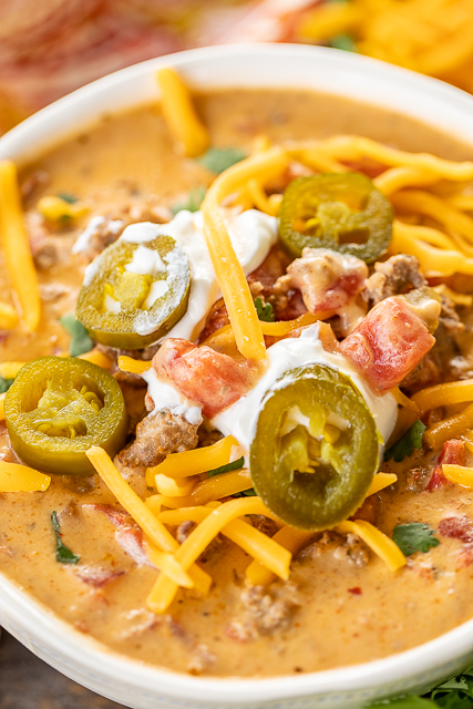 Low-Carb Taco Soup - SO good! I wanted to lick the bowl!! If you aren't doing low-carb, feel free to add corn and black beans. Ground beef, taco seasoning, Ranch dressing mix, diced tomatoes and green chilies, cream cheese, Velveeta, beef broth. Just dump every in the crock pot and dinner is done. Can freeze leftovers for a quick meal later. This soup is seriously delicious!! #crockpot #slowcooker #soup #taco #lowcarb Low-Carb Taco Soup - SO good! I wanted to lick the bowl!! If you aren't doing low-carb, feel free to add corn and black beans. Ground beef, taco seasoning, Ranch dressing mix, diced tomatoes and green chilies, cream cheese, Velveeta, beef broth. Just dump every in the crock pot and dinner is done. Can freeze leftovers for a quick meal later. This soup is seriously delicious!! #crockpot #slowcooker #soup #taco #lowcarb