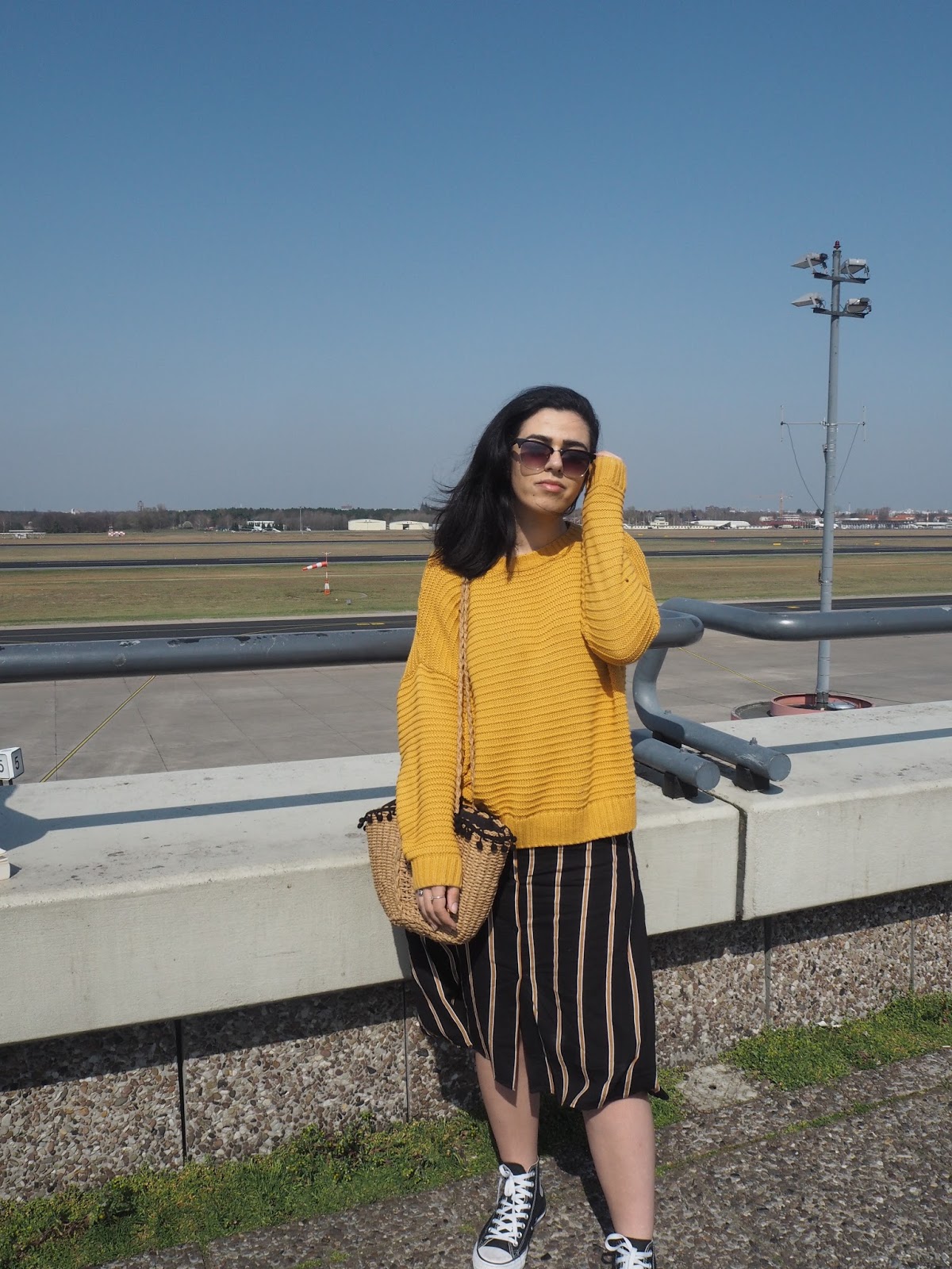 girl stood at airplane viewpoint