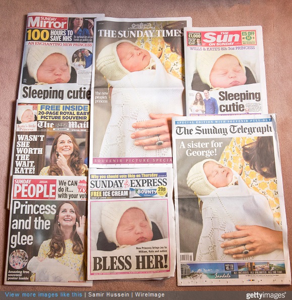 LONDON, ENGLAND - MAY 03: The British newspaper front pages are seen following Catherine, Duchess of Cambridge, Prince William, Duke of Cambridge introducing their newborn daughter at The Lindo Wing of St Mary's Hospital on May 3, 2015 in London, England.