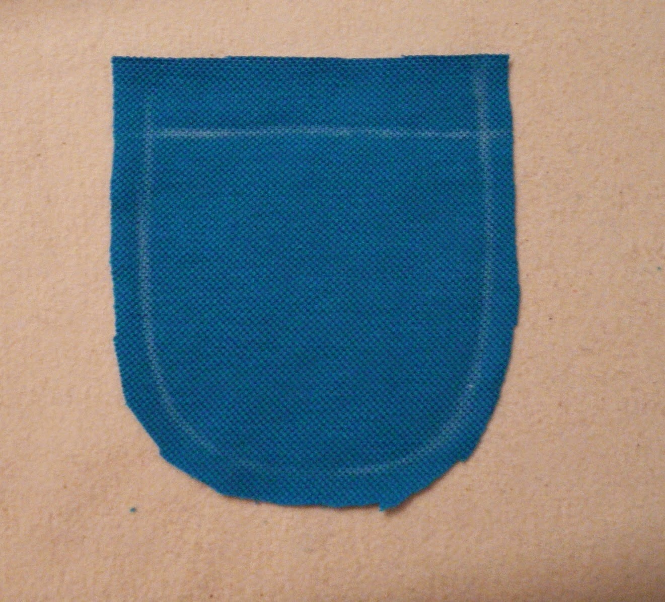 бесхитростный карманчик. шитье в начальной школе. накладные карманы в одежде. накладные карманы. накладные карманы спицами.