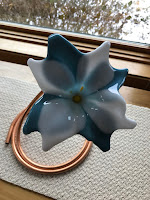 mounted blue glass flower