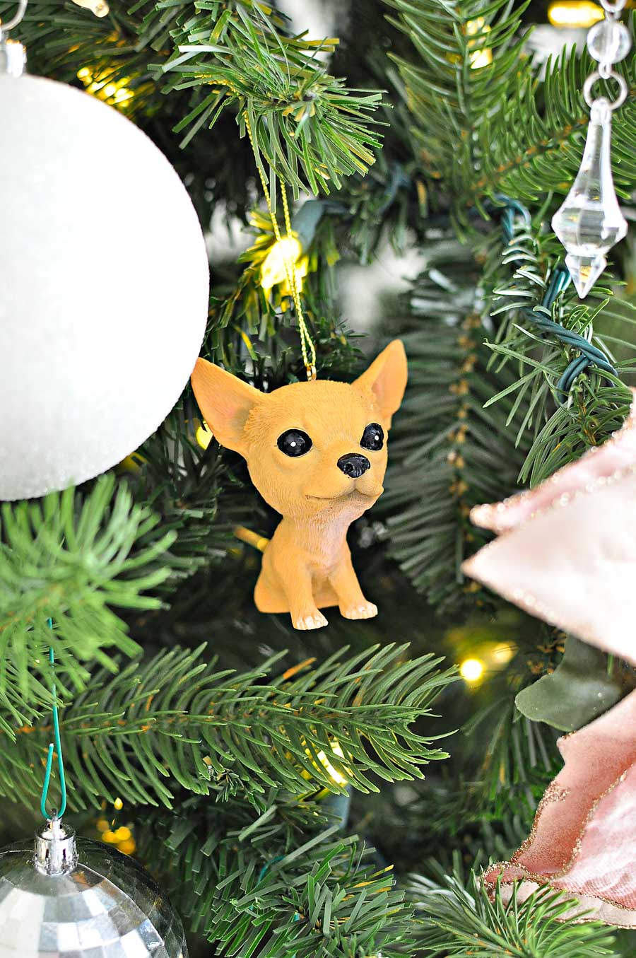 A cute chihuahua dog ornament is a way to incorporate the family pet into holiday decor traditions. A cute chihuahua dog ornament is a way to incorporate the family pet into holiday decor traditions.