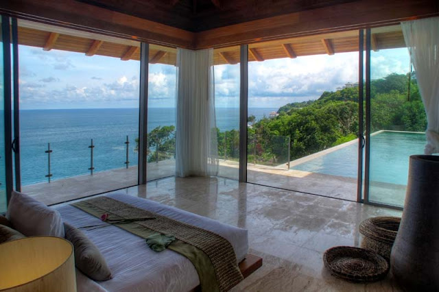 Corner bedroom with ocean view and swimming pool