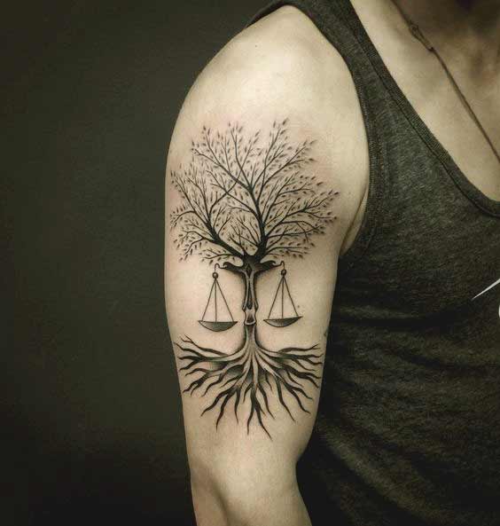 best Libra tattoo design with tree on bicep