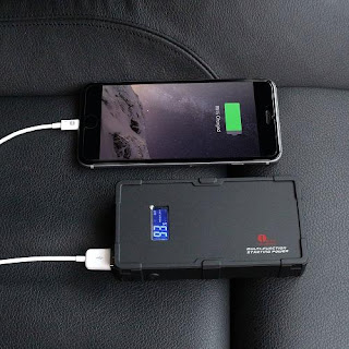 The 1byone Portable Car Jump Starter charging an iPhone