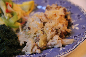 A cabbage and rice dish, commonly called dressing here in the Deep South, made with the trinity sauteed in bacon drippings, stewed down with cabbage, browned ground beef or sausage, cooked rice, and cream soup, baked, and finished with a buttered bread crumb topping. Pictured here with my collard greens and squash salad.
