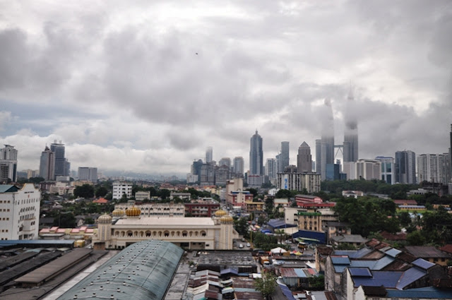My first tour in Kuala Lumpur and Hop-On Hop-Off ride View of Petronas Tower from Cititel Express