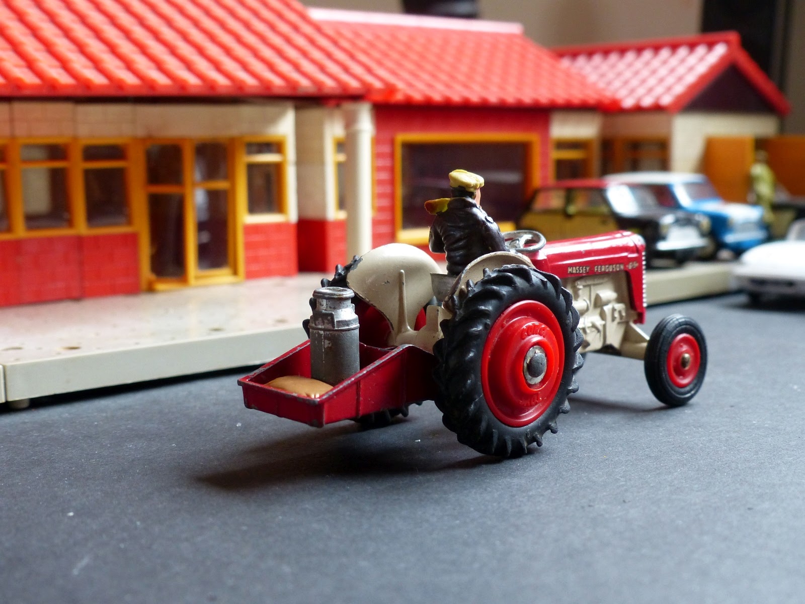 A small collection of Corgi Toys farm vehicles and accessories, comprising  a No. 54 Fordson 'Po