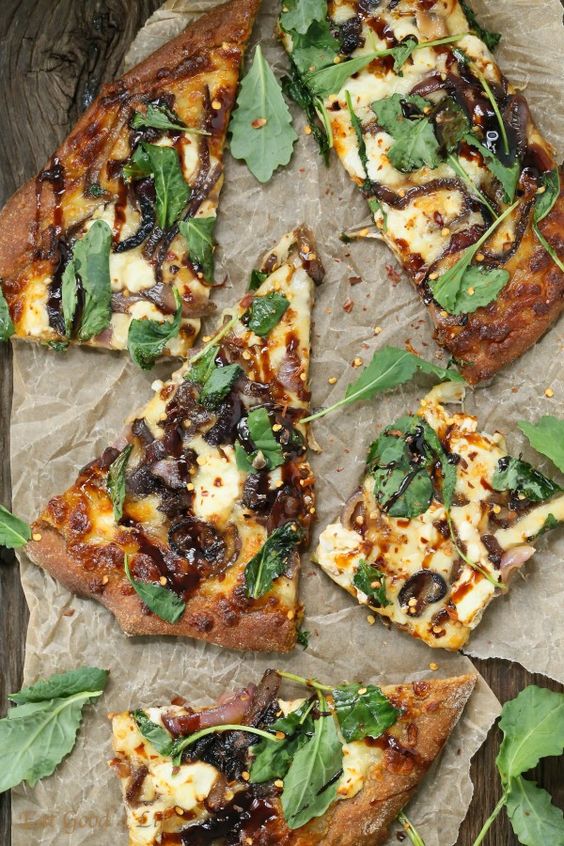 Eat Good 4 Life caramelized onion kale goat cheese pizza with balsamic drizzle. This is made with whole wheat pizza dough. Eat Good 4 Life caramelized onion kale goat cheese pizza with balsamic drizzle. This is made with whole wheat pizza dough.