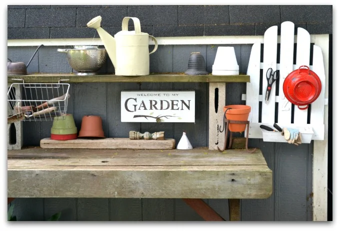 An Adirondack chair repurposed makes great potting bench organization. Homeroad.net