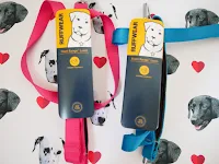 two ruffwear leads one pink and one blue on white background