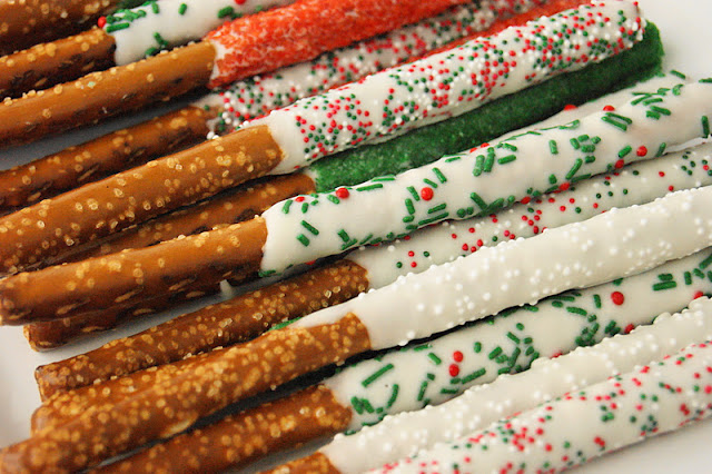 White Chocolate-Dipped Pretzel Rods image ~ Pretzels get all dressed up for Christmas with the help of beautiful holiday sprinkles!  Or, change the sprinkle colors to match any occasion.   www.thekitchenismyplayground.com