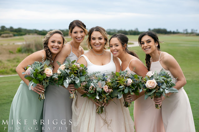 Bride with bridesmaids; succulent wedding bouquets