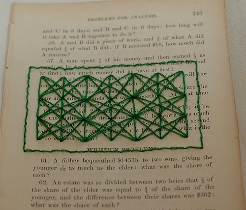 Green stitching on vintage book page is featured in a round up of paper stitching by Jessica Kelly. Rectangular green stitched design on vintage book page