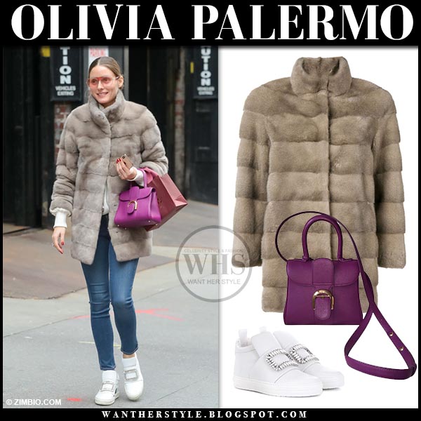 Olivia Palermo in fur coat with purple bag and white sneakers in