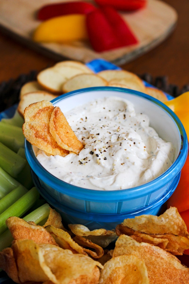 Kicked-Up Greek Yogurt Ranch Dip is made with tangy Greek yogurt, ranch dressing mix, and zippy spices. You will want to make this dip again and again!  #appetizer #greekyogurt #ranchdip