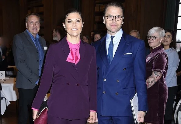 Crown Princess Victoria wears Caroline Svedbom Jewelry Drop Earring, and carried & Other Stories Scuba Clutch