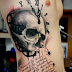 3D black and white skull tattoo on side body