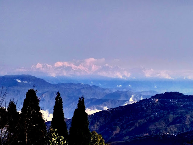 Batasia loop and war memorial view of Kanchenjunga from Batasia Loop in Darjeeling
