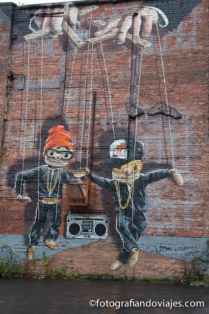 Grafitis en el centro de Glasgow Marionetas de Rogue-one