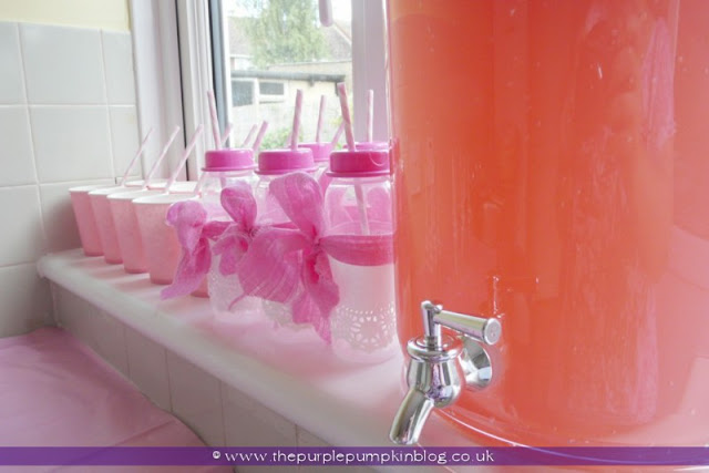 Decorated Drinks Baby Bottles for a Baby Shower at The Purple Pumpkin Blog