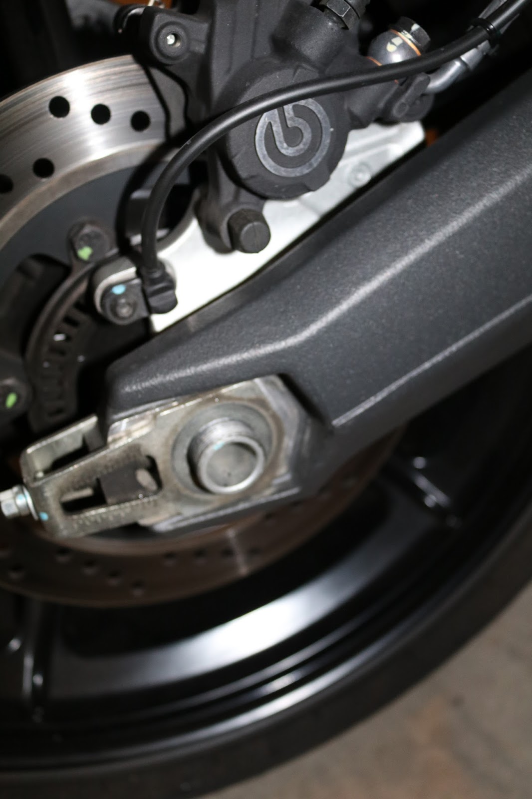 OldMotoDude Loosening and tightening the axle nut on 2015 Ducati Scrambler