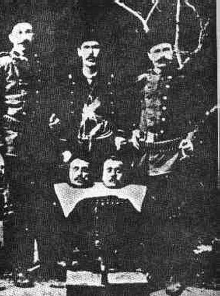 The Recognition of the genocides as the beginning of justice against the crimes against humanity and barbarity - Turkish soldiers posing proudly with heads of their victims.