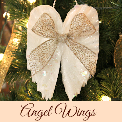 Gold bow on angel wing ornaments