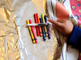 Peel crayons to make Melted Crayon Friendship Rocks