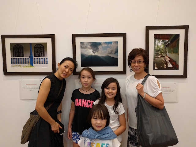 Kids with their mothers at Milind Sathe's solo photography show - My pictures with their little stories (www.milind-sathe.com)