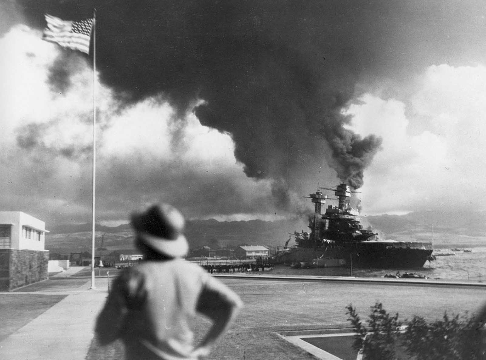 American ships burn during the Japanese attack on Pearl Harbor, Hawaii, on December 7, 1941.