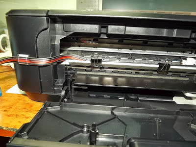 hoses coming out of the printer system