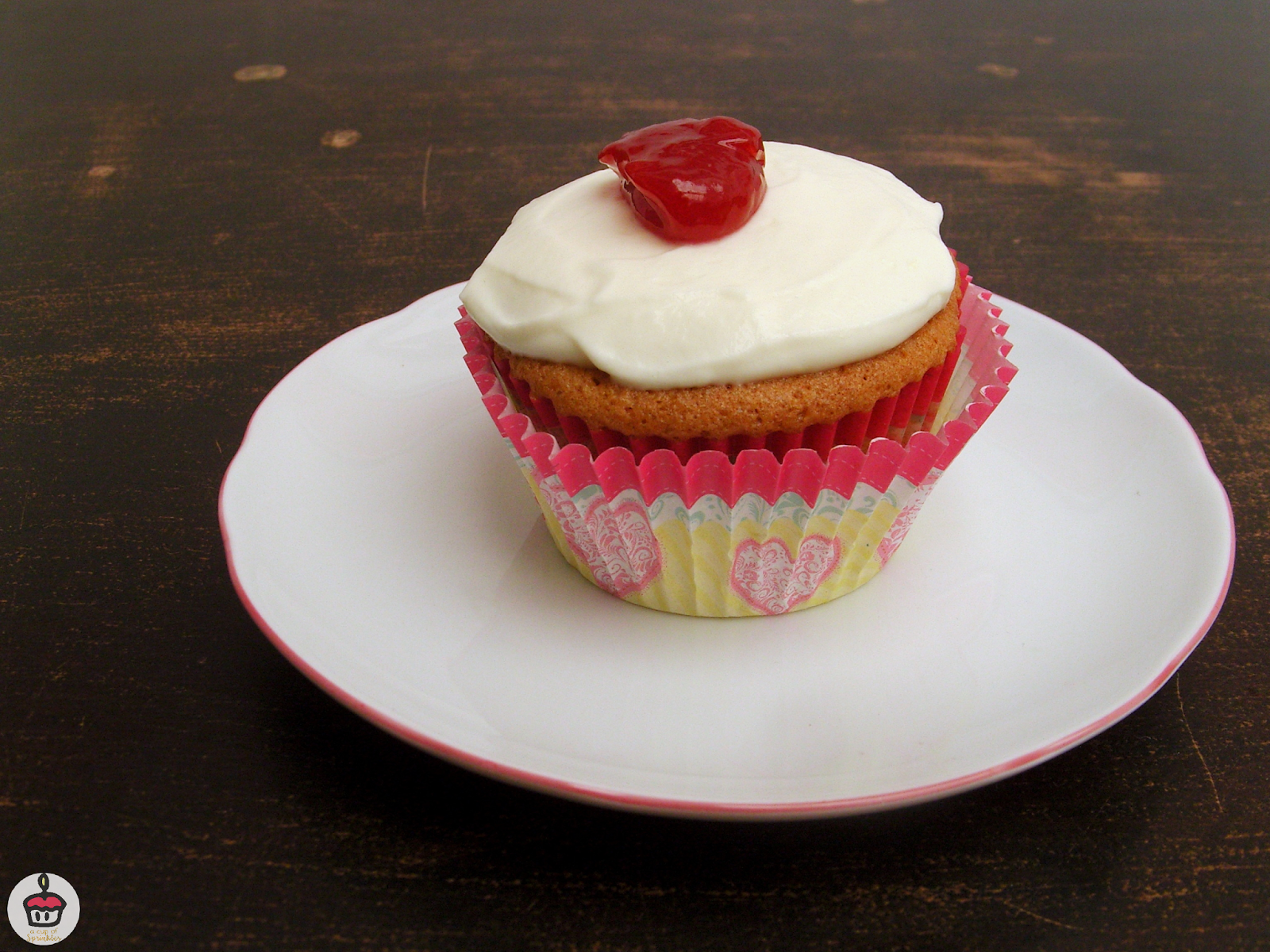 Raspberry Mascarpone Cupcakes These vanilla cupcakes have a delicous raspberry filling and a light and fluffy mascarpone frosting.