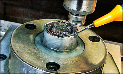 Coin stamp being made