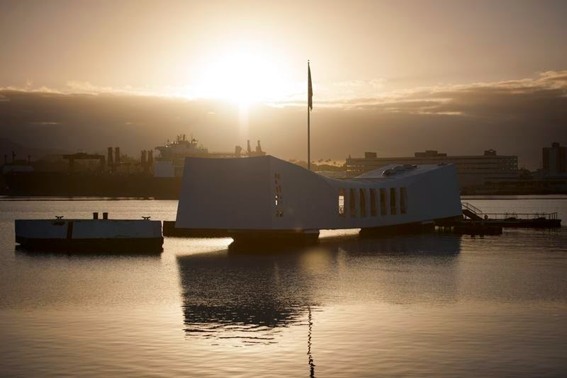 The USS Arizona Memorial is built over the sunken wreckage of the USS Arizona, the final resting place for many of the 1,177 crewmen killed on December 7, 1941 when Japanese Naval Forces bombed Pearl Harbor.