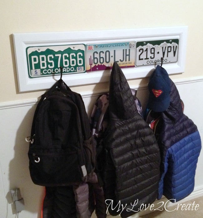 License plate coat racks hanging in kids room