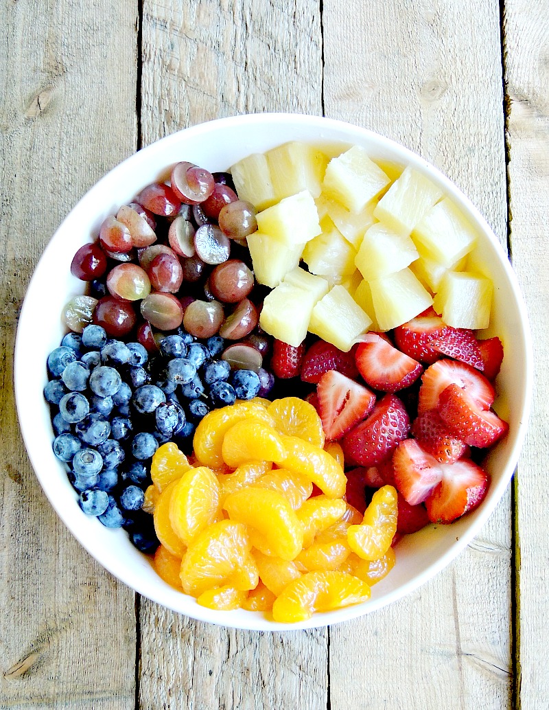 Rainbow Fruit Salad - Celebrate the flavors of summer with this easy to make refreshing fruit salad recipe. Eating the rainbow never tasted better! #vegetarian #glutenfree #healthy #fruit #salad #recipe | bobbiskozykitchen.com