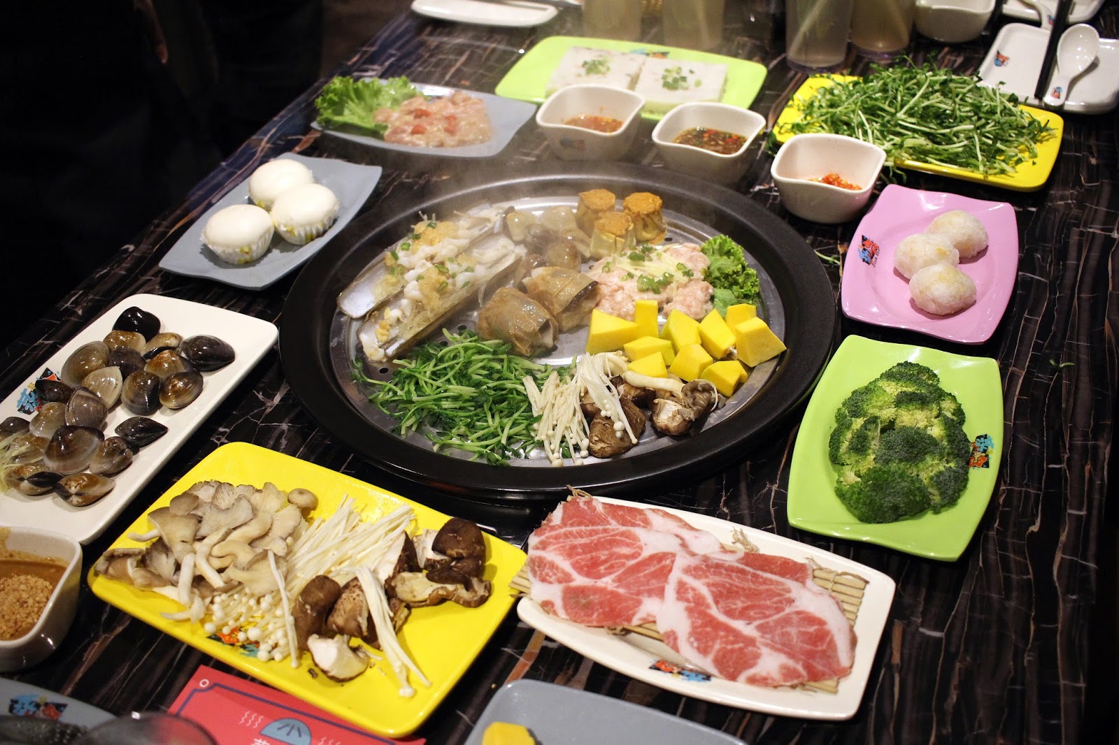 The steaming process retains the original flavors and nutrients of the food, making it a healthier option compared to the traditional hotpot