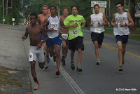 The leaders of Chipley's 34th annual Hot Trot 5K take a turn midway through the second kilometer of the race, 23 June 2012. 2012 Hot Trot 5K