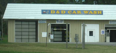 Metal building with sign reading D&D Car Wash