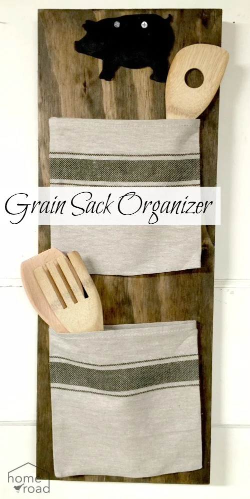 Grain Sack Bag Organizer with wooden spoons, a pig and an overlay