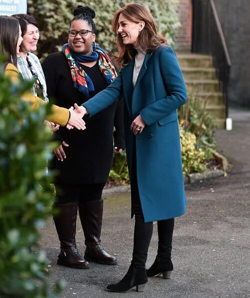 Kate Middleton wore Sezane Tulio jumper, Russell and Bromley FAB Dry ankle boots, Accessorize Filigree gold earrings, a blue wool coat