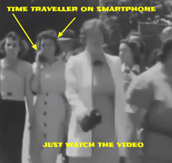Woman time traveller caught talking in to a cell phone in an old black and white film. Woman time traveller caught talking in to a cell phone in an old black and white film.