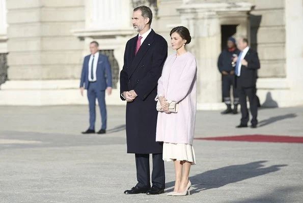 Queen Letizia wore ASOS DESIGN Tall midi dress with pretty floral and bird embroidery.  First Lady Peng Liyuan. Carolina Herrera coat