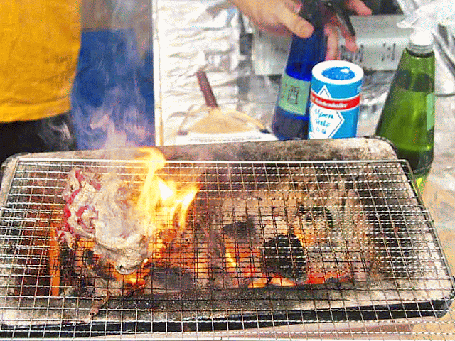 pork cooking on a charcoal grill, gif, flames