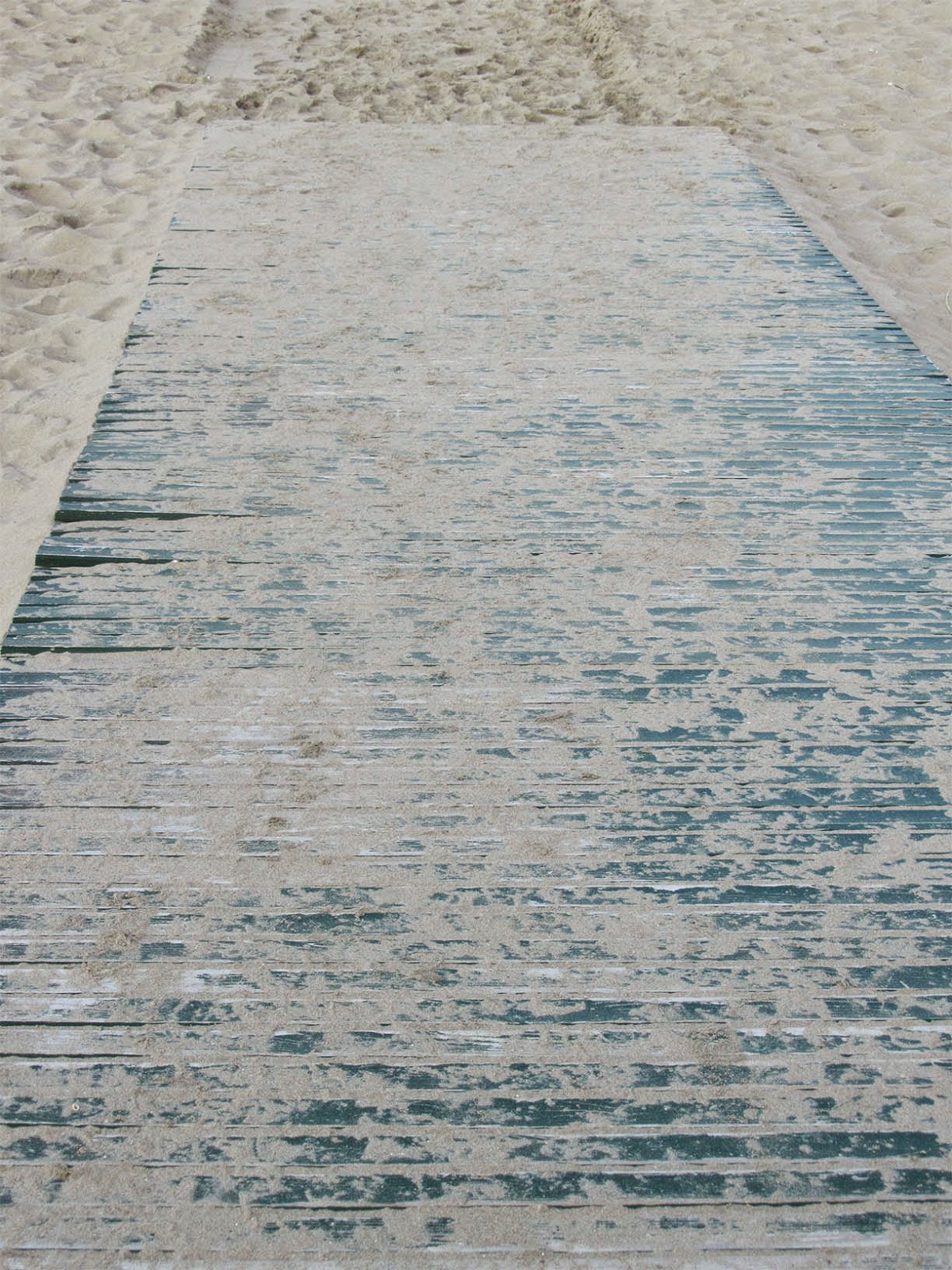 wooden floor leading to the beach