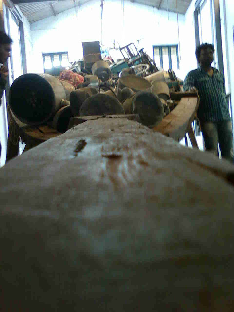 A small miniature earth Boat with waste parts