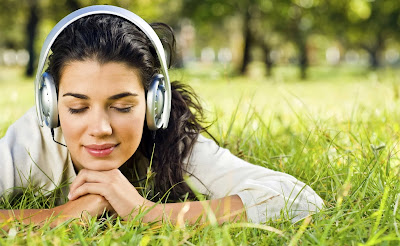 Girl with headphones in Park wallpaper